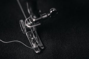 sewing machine stitching cloth